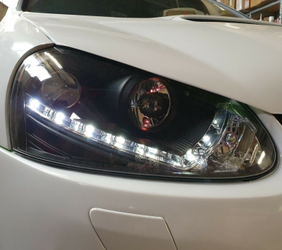 Scheinwerfer für VW Jetta 05-10 Tagfahrlicht-Optik schwarz Sonar